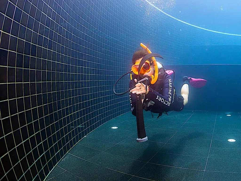 Practicing Neutral Buoyancy Skills in a Swimming Pool